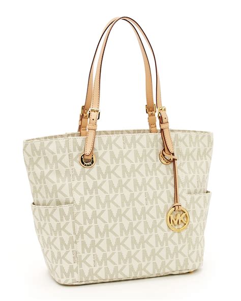 michael kors jet set logo large tote vanilla|Michael Kors jet set girls.